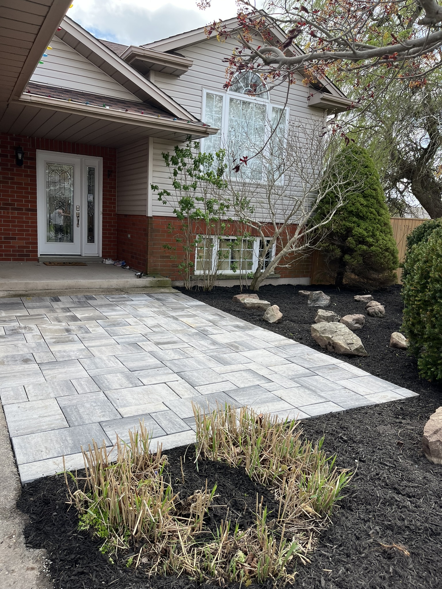 Precision-laid interlocking paver patio with clean borders